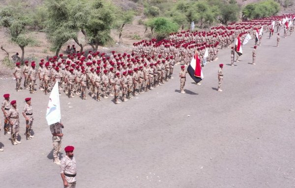 Houthi fighters take part in a graduation ceremony in Yemen on June 27. [Houthi-affiliated SABA News Agency]