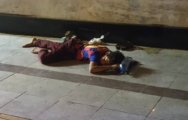 A homeless child seen on a street in Tehran on July 19. An increasing number of minors, called 'children of labour', work and sleep on the streets in Tehran and other major Iranian cities. [Social media]
