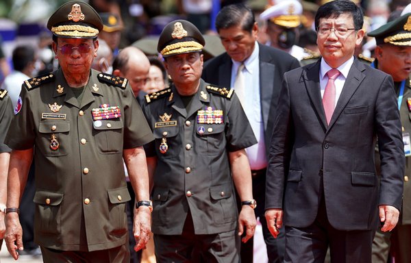 Cambodian Defence Minister Tea Banh (left) and Chinese Ambassador to Cambodia Wang Wentian (right) take part in a groundbreaking ceremony at the Ream naval base in Preah Sihanouk province, Cambodia, on June 8. [Pann Bony/AFP]