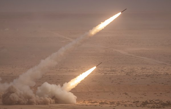 A US M142 High Mobility Artillery Rocket System (HIMARS) fires salvoes during the second annual 'African Lion' military exercise in the Tan-Tan region of Morocco on June 30. [Fadel Senna/AFP]
