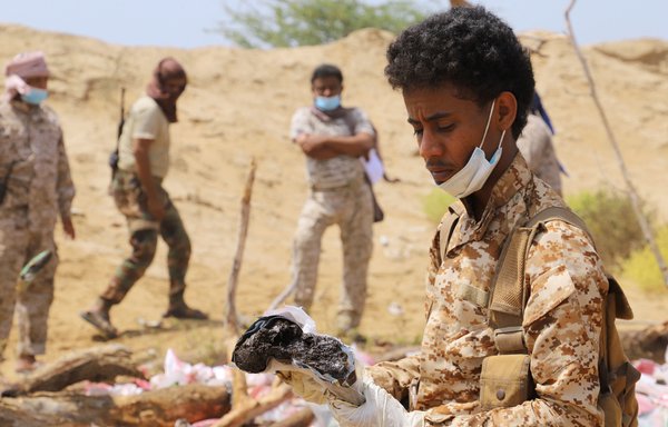 Yemeni forces prepare to burn confiscated drugs in Hajjah province on March 3. [AFP]