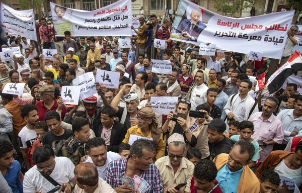 Yemeni demonstrators July 26 in Taez protest a years-long blockade of their city imposed by the Houthis. [Ahmad al-Basha/AFP]