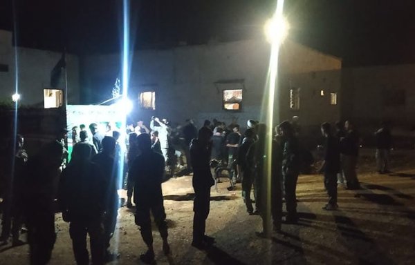 Members of the Fatemiyoun Division take part in a ceremony on August 6. [Fatemiyoun Telegram account]