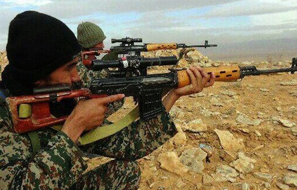 IRGC-backed Fatemiyoun militia elements are shown in the Syrian Badiya (eastern desert) near Palmyra in 2017. [Tasnim News]