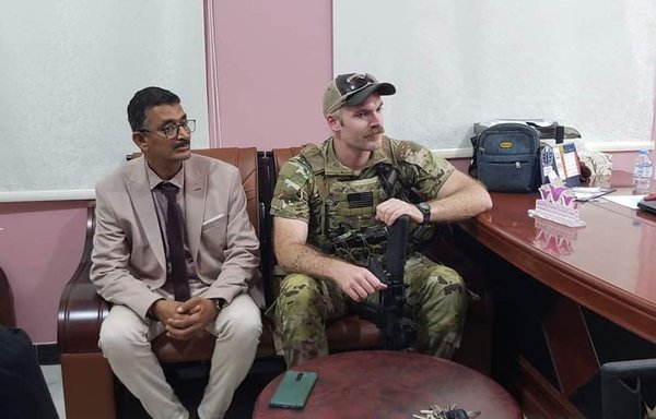 A US Army Civil Affairs soldier is pictured with Ahmed Salem Badhrous, director-general of the Ministry of Social Affairs and Labour's Hadramaut office, on August 14. [Yemeni Ministry of Social Affairs and Labour]