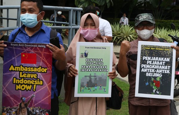 Demonstrators protest China's claims on the disputed South China Sea, outside the Chinese embassy in Jakarta, Indonesia, last December 8. [Dasril Roszandi/AFP]