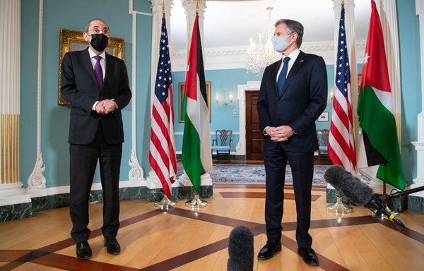Jordanian Foreign Minister Ayman Safadi and US Secretary of State Antony Blinken speak to the media prior to a meeting in Washington, DC, on May 10, 2021. [Saul Loeb/Pool/AFP]