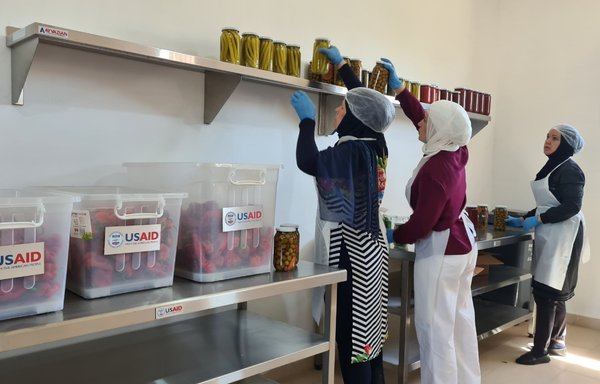 Women prepare food to sell at a co-operative in Majdal Anjar that has been a recipient of USAID funding. [USAID-Funded Community Support Programme]