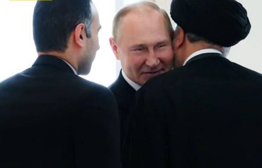 Iran bows deeper to Russia, China with SCO membership