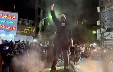 At heart of historic uprising, women cause Iranian regime to panic