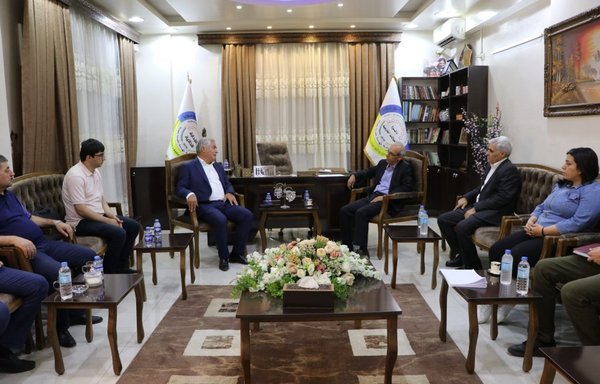 A delegation from Tajikistan meets with the Syrian Democratic Council in preparation for the repatriation of Tajik citizens from the Roj camp on July 25. [Executive Council of North and East Syria]
