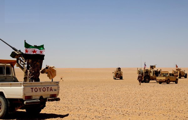 US forces operating as part of the international coalition and Jaish Maghawir al-Thawra take part in joint exercises in Area 55 (a 55km-radius deconfliction zone) on August 21. [Jaish Maghawir al-Thawra]