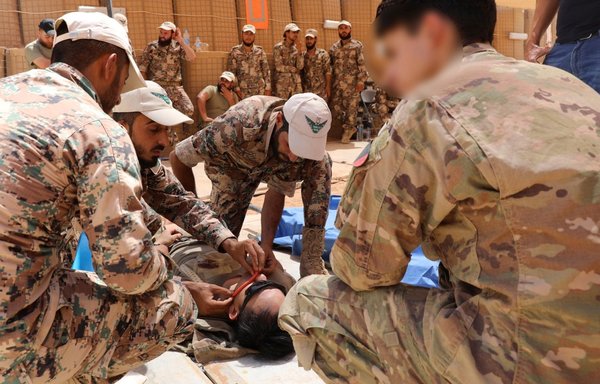 Jaish Maghawir al-Thawra paramedics undergo a course conducted by paramedics of the international coalition on October 17. [Jaish Maghawir al-Thawra]
