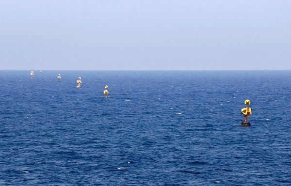 A picture shows border-marking buoys in the Mediterranean waters off the coast of Ras al-Naqura on May 4, 2021. [Jack Guez/AFP]