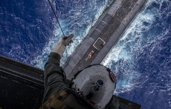 A US Marine lowers a payload from an MV-22B Osprey to the ballistic missile submarine USS Henry M. Jackson around the Hawaiian Islands, October 21, 2020. [US Department of Defence]