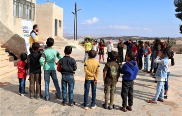 In northern Syria, White Helmets race to clear cluster munitions