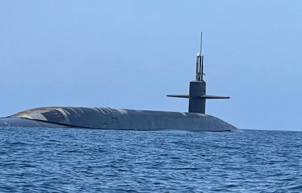 USS West Virginia, a US Navy Ohio-class ballistic missile submarine, is seen here at an undisclosed location in international waters in the Arabian Sea on October 19. [CENTCOM]