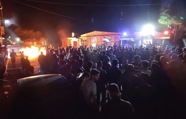 Protesters in rural Aleppo take part in a demonstration in rejection of the rule of extremist alliance Tahrir al-Sham. [Hadi al-Abdullah Facebook page] ‎