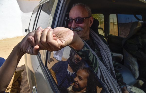 Polisario Front secretary-general Brahim Ghali arrives in the Aousserd camp on the outskirts of the Algerian city of Tindouf, on October 12. [Ryad Kramdi/AFP]