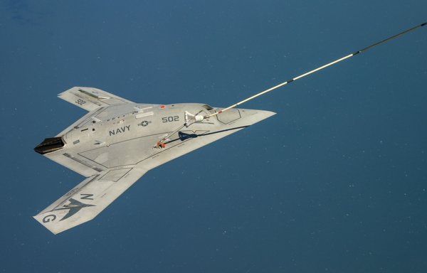 The US Navy's unmanned X-47B receives fuel from an Omega K-707 tanker while operating in the Atlantic Test Ranges over the Chesapeake Bay on April 22, 2015. [US Navy]