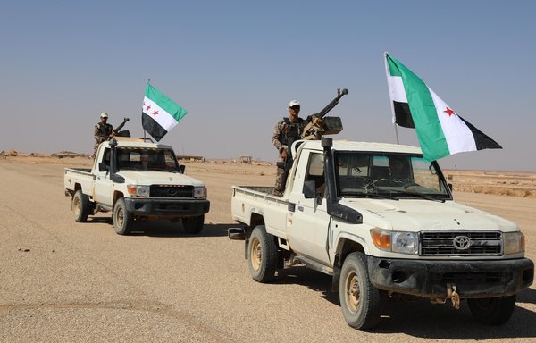 Jaish Maghawir al-Thawra elements conduct a patrol. The militia is in charge of providing security for the Eastern Desert area of southern Syria around al-Tanf base. [Jaish Maghawir al-Thawra]