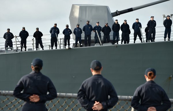 Sailors aboard a US destroyer depart the naval base in Rota, Spain. [US Navy]