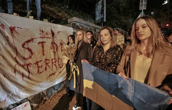 People demonstrate outside the Iranian embassy in Kyiv, Ukraine, on October 17, after the city was hit by swarms of kamikaze drones sold by Iran to Russia, leaving at least three dead. [Sergei Chuzavkov/AFP]