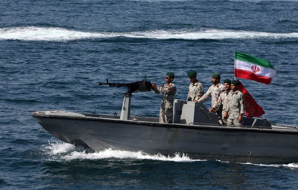 Iranian soldiers in the Strait of Hormuz, on April 30, 2019. [Atta Kenare/AFP]