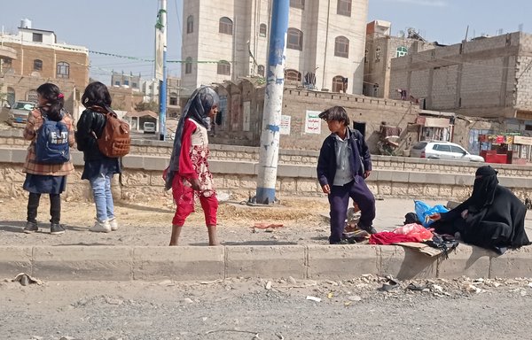 Seven-year-old Malak, centre, in red, told Al-Mashareq she wishes she could attend school with her peers. [Haitham Mohammed/Al-Mashareq]