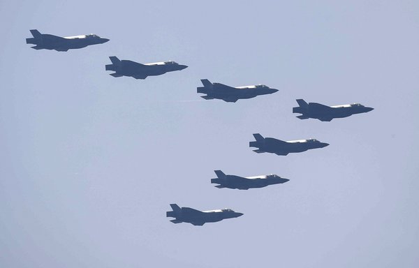 This picture taken on September 29, and released on October 1, shows South Korea's F-35A fighter jets participating in media day for the 74th anniversary of Armed Forces Day at the military base in Gyeryong city, ahead of Armed Forces Day. [Jeon Heon-Kyun/AFP]