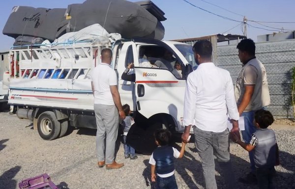 Iraqis leave Mosul displacement camps to return to their original homes in Ninawa province on December 11. [Iraqi Ministry of Migration and Displacement]