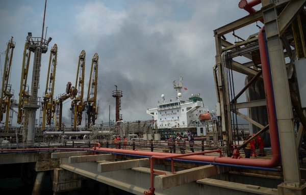 The Iranian-flagged oil tanker Fortune is docked at El Palito refinery after its arrival at Puerto Cabello, Venezuela, on May 25, 2020. [AFP]