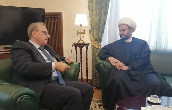 Harakat al-Nujaba leader Akram al-Kaabi meets with Russian Deputy Foreign Minister Mikhail Bogdanov in Moscow in late November. [Al-Nujaba Lebanon/Twitter]
