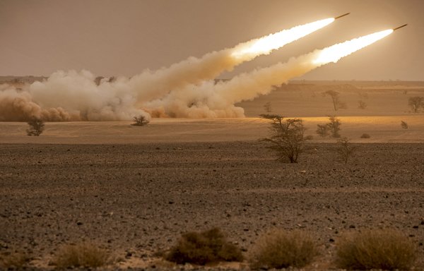HIMARS launchers fire salvoes during a military exercise in Morocco in 2021. [Fadel Senna/AFP]