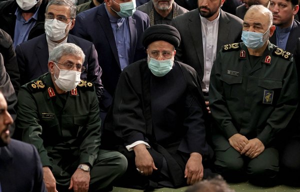 IRGC Quds Force commander Esmail Qaani, Iranian President Ebrahim Raisi and IRGC commander Hossein Salami attend a ceremony in Tehran on January 3, marking the third anniversary of Qassem Soleimani's death. [Atta Kenare/AFP]