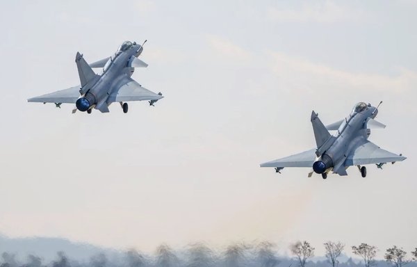 Two J-10s take off from a runway on January 6. [Chinese Ministry of Defence]