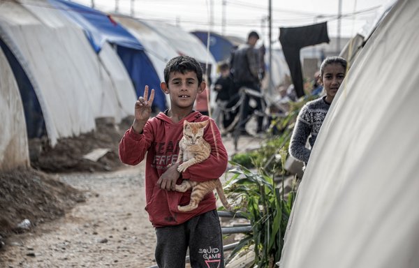 Residents of the Jadaa camp for the displaced near the Iraqi city of Mosul on December 21, 2022. [Zaid AL-OBEIDI / AFP]