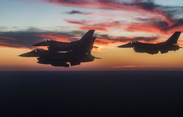 Three battle-tested F-16s fly in formation on September 24, 2021. [US Air Force]