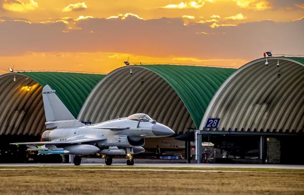 A Chinese air force J-10 taxis near a hangar last November 8. [Chinese Ministry of Defence]
