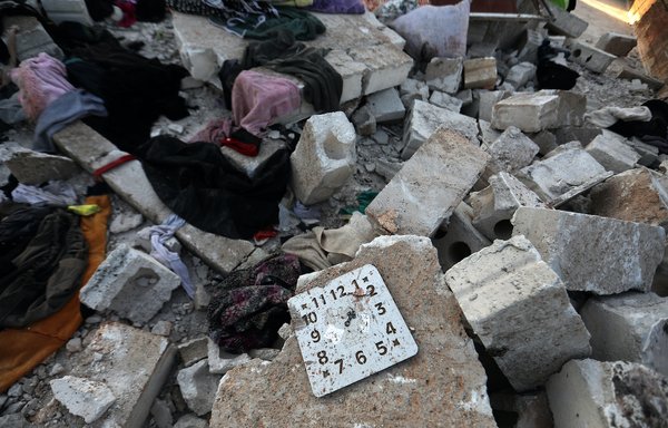 Objects are scattered in the house where ISIS leader Amir Mohammed Said Abd al-Rahman al-Mawla, aka Abu Ibrahim al-Hashimi al-Qurashi, died, on February 3, 2022, during a raid by US special forces, in Idlib province, Syria. [Aaref Watad/AFP]