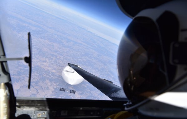 A US Air Force pilot looks down at a suspected Chinese surveillance balloon as it hovers over the central United States on February 3. [US Department of Defence]
