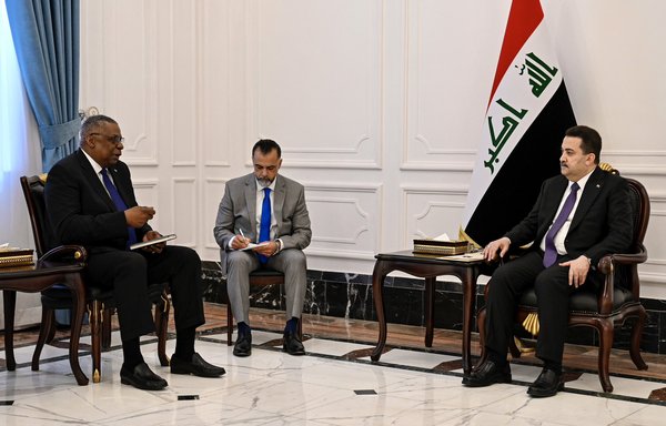 Pentagon chief Lloyd Austin (L) meets with Iraqi Prime Minister Mohammed Shia al-Sudani during an unannounced visit to Iraq on March 7. [@SecDef Twitter account]