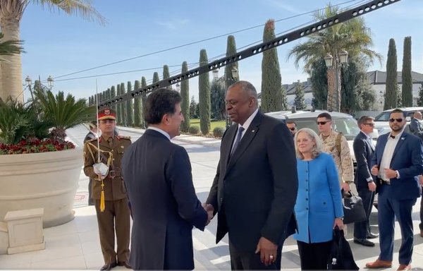 Nechirvan Barzani, president of Iraq's autonomous Kurdish region, greets US Secretary of Defence Lloyd Austin on March 7. [Screenshot from video posted on @SecDef Twitter account]