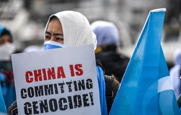 Protesters near the Chinese consulate in Istanbul in 2021. [Ozan Kose/AFP]