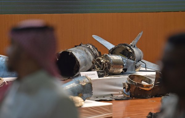 A picture taken on September 18, 2019, shows displayed fragments of what the Saudi defence ministry said were Iranian cruise missiles and drones recovered from the attack site that targeted Saudi Aramco's facilities. [Fayez Nureldine/AFP]