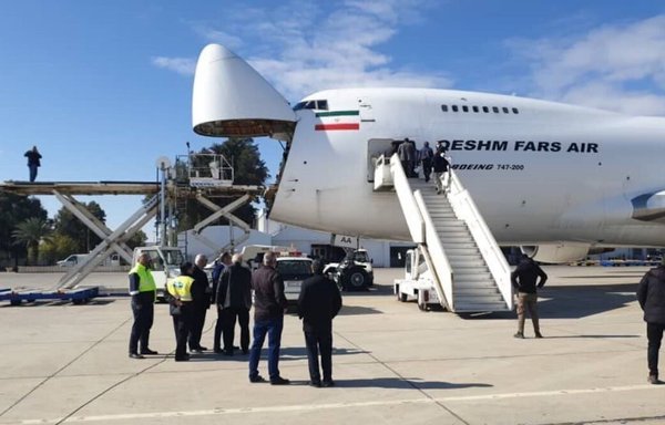 This photo from a Hizbullah-controlled media outlet shows Iranian planes preparing to unload aid at Damascus International Airport on February 9. A new Reuters report reveals that weapons have been brought in under the guise of aid. [Al-Manar]