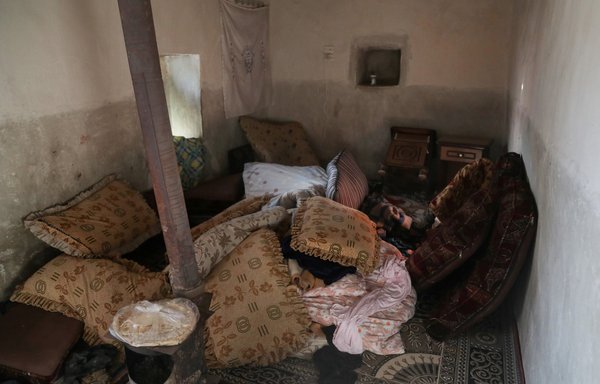 The interior of a house is seen here following a US helicopter raid on an ISIS leader in a village near Jarablus in northern Syria's Aleppo province on April 17. [Bakr Alkasem/AFP]