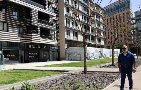 A man walks past the Artual Gallery in Beirut on April 19, an art gallery owned by Hind Ahmad, the daughter of Nazem Said Ahmad, whom the US Treasury accused of financing Hizbullah. [Joseph Eid/AFP]