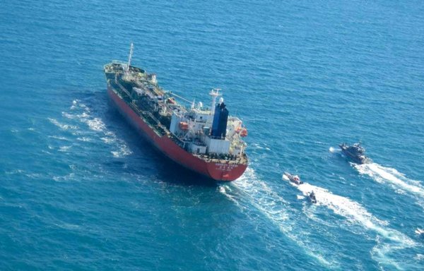 IRGC ships escorting a seized tanker in 2021. [Tasnim News/AFP]