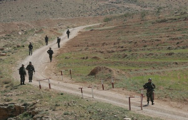 There are more than 150 illegal border crossings between Lebanon and Syria. In this photo, the Lebanese Armed Forces are patrolling the border to curb smuggling activity between the two countries. [Ziad Hatem]